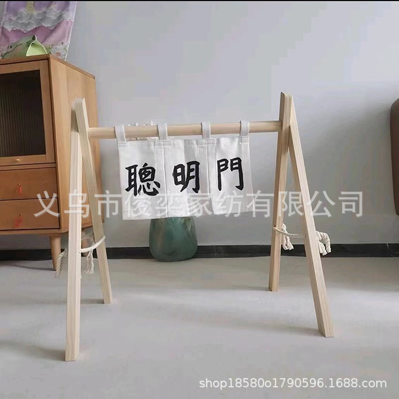One-year-old baby catches Zhou props over smart door curtain I am one-year-old catches Zhou ceremony hanging curtain photo curtain