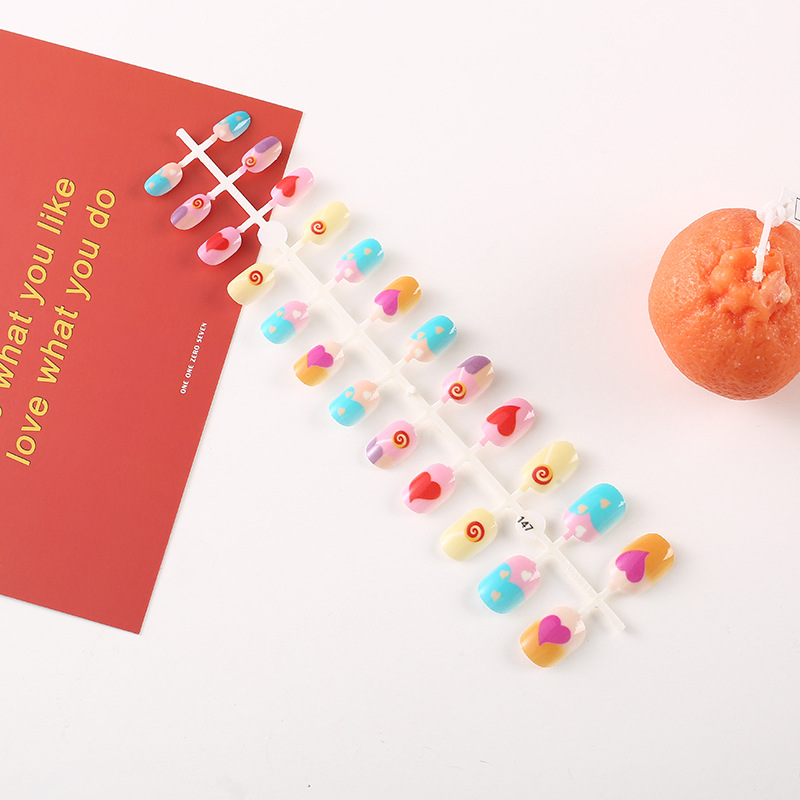 Nuevo desgaste de los niños uñas color amor niños uñas pegatinas patrón simple pintado de uñas en stock comercio exterior exclusivo