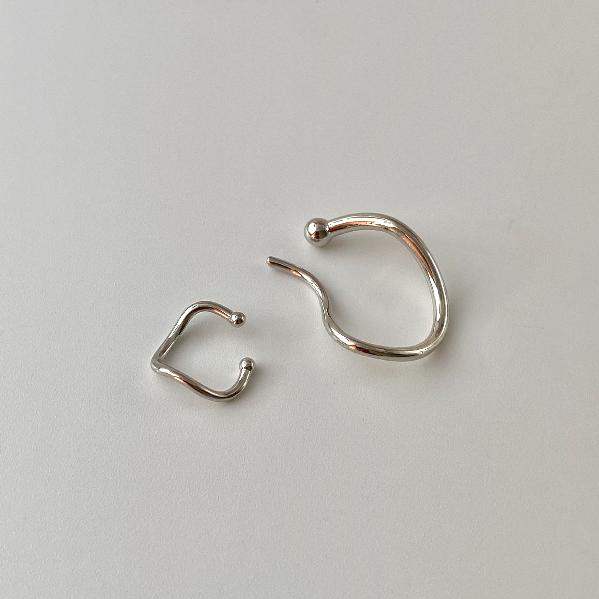 Corea del Sur nicho diseño temperamento simple clip de hueso de oreja pendientes Estilo frío geométrico clip de oreja de metal sin orejas de mujer