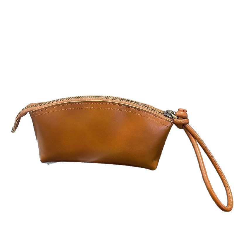 Viajes de moda primavera y verano nuevo nicho de diseño pu piel retrógrada elegante portátil bolso de bollo de gran capacidad transfronterizo para mujeres