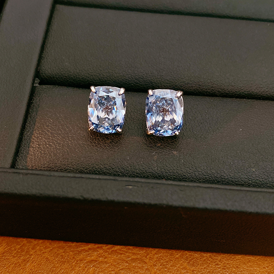 Elegante simple geometría pernos de piedra de silicio estilo frío temperamento personalidad pendientes ligeros de lujo alta sensación de auriculares al por mayor