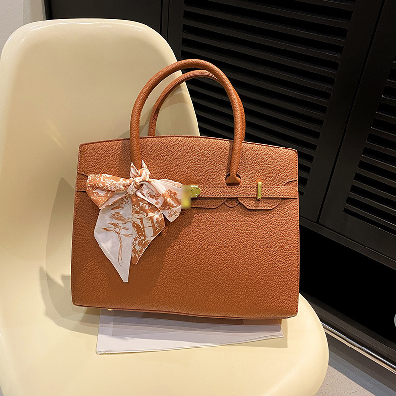Gran capacidad de Kelly bolso para mujeres 2026 nuevo nicho de lujo viaje ligero bolso de hombro de alta sensación bolso de mujer
