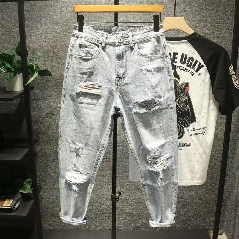 Męskie jeansy vintage z przetarciami o prostym i luźnym kroju_voghion.com