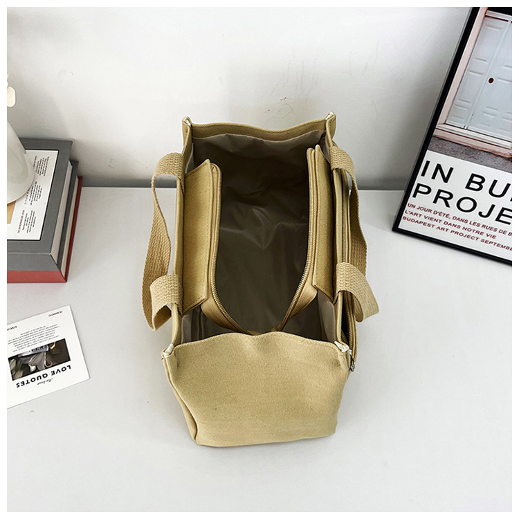 New wholesale fashionable and high-quality canvas handbag, simple and portable, easy to carry for going out, versatile lunch box and bento bag undefined