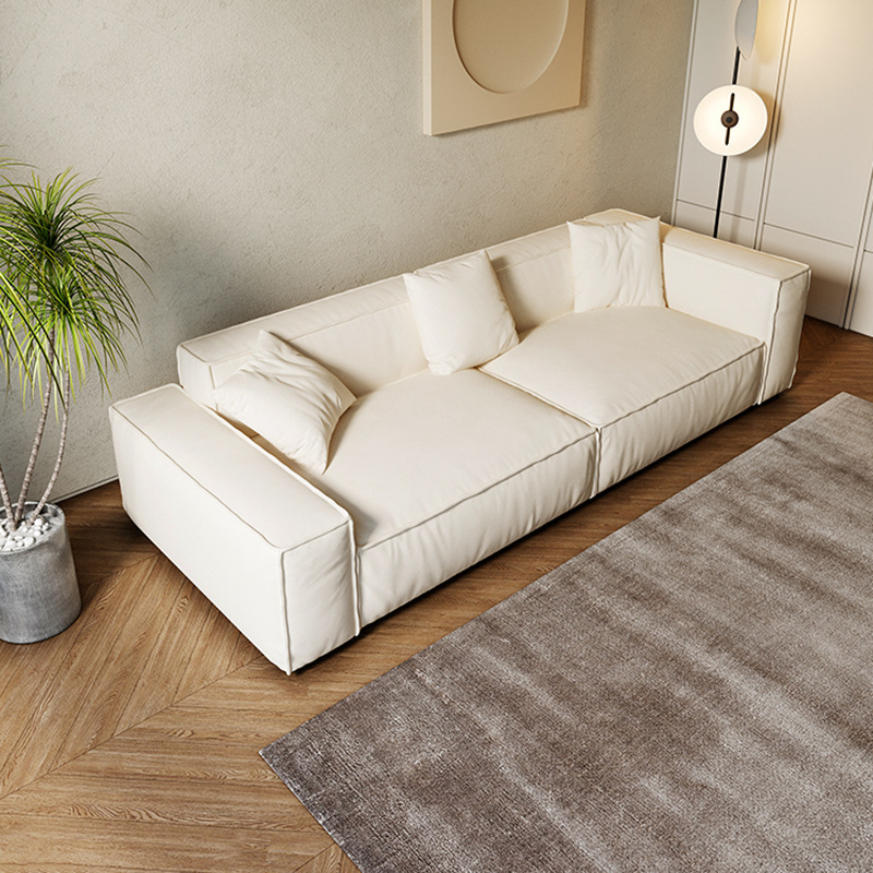 Sofá de cuero genuino estilo tofu italiano para sala de estar, combinación artística moderna minimalista de tres plazas en cuero de grano superior, lujo ligero moderno.