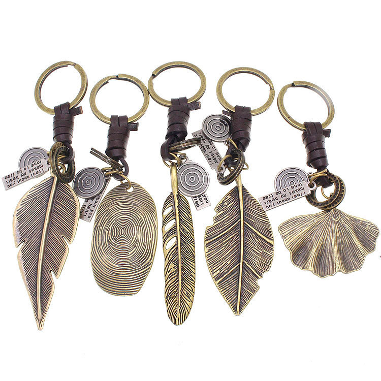 NQ261 Export European and American Metal Retro Woven Leather Pendant Bronze Leaf Feather Leather Keychain
