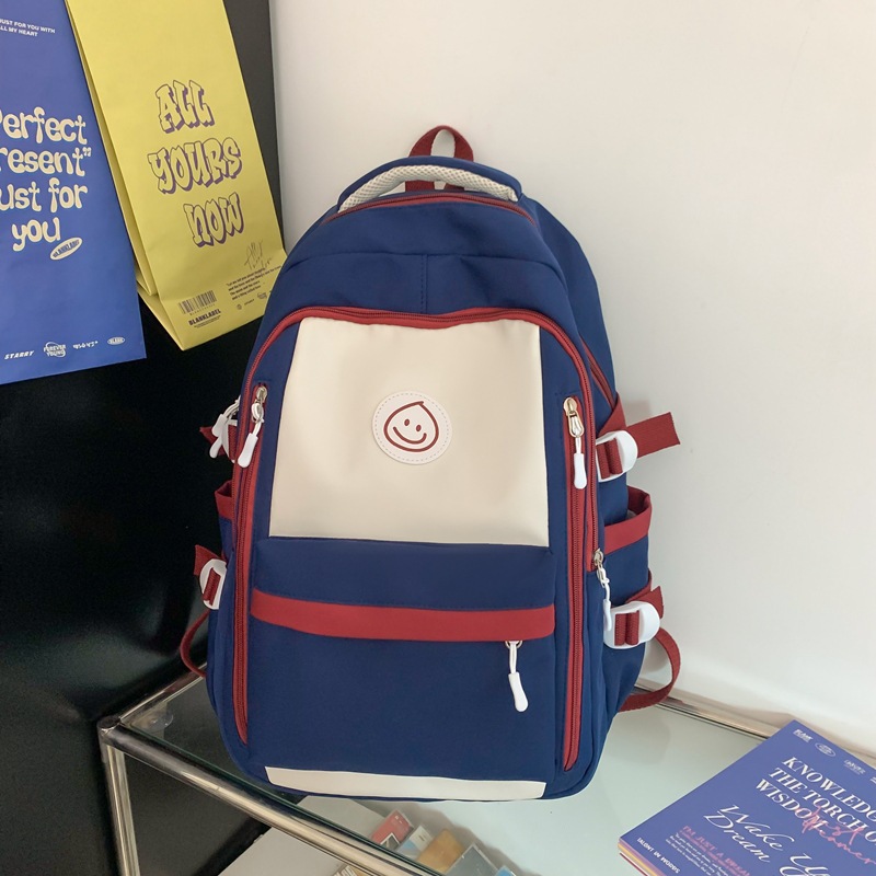 Mochila de lona coreana simple y versátil para mujeres 2023 nueva bolsa de gota de lluvia de gran capacidad mochila de ocio mochila de estudiantes