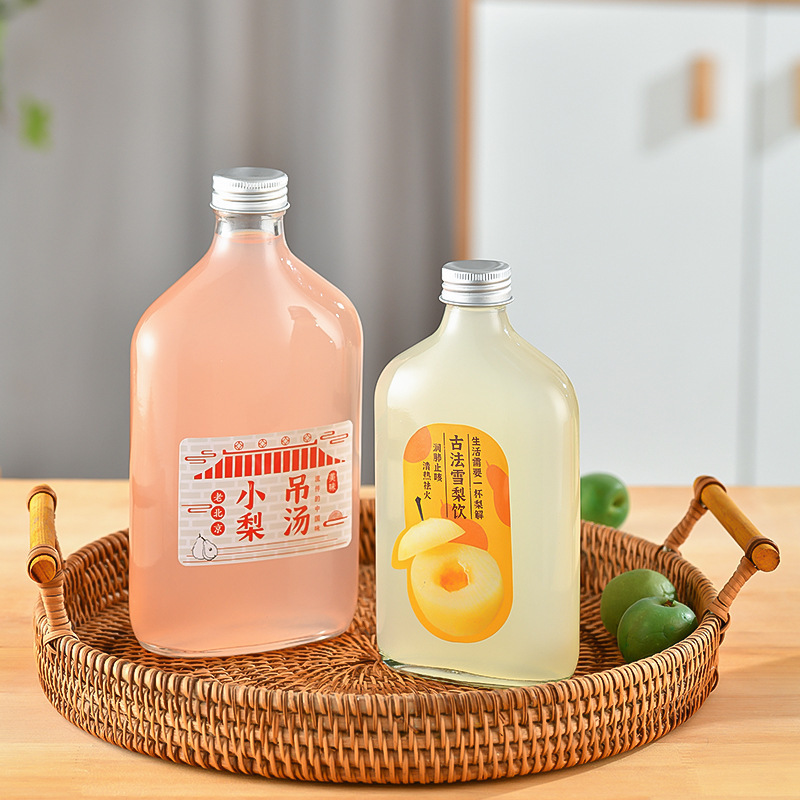 New Style Juice Bottle with Slanted Shoulder, Glass Beverage Bottle, Sealed Empty Bottle, High Aesthetic Value, Food-Grade Bottle, Wholesale in Stock, Transparent