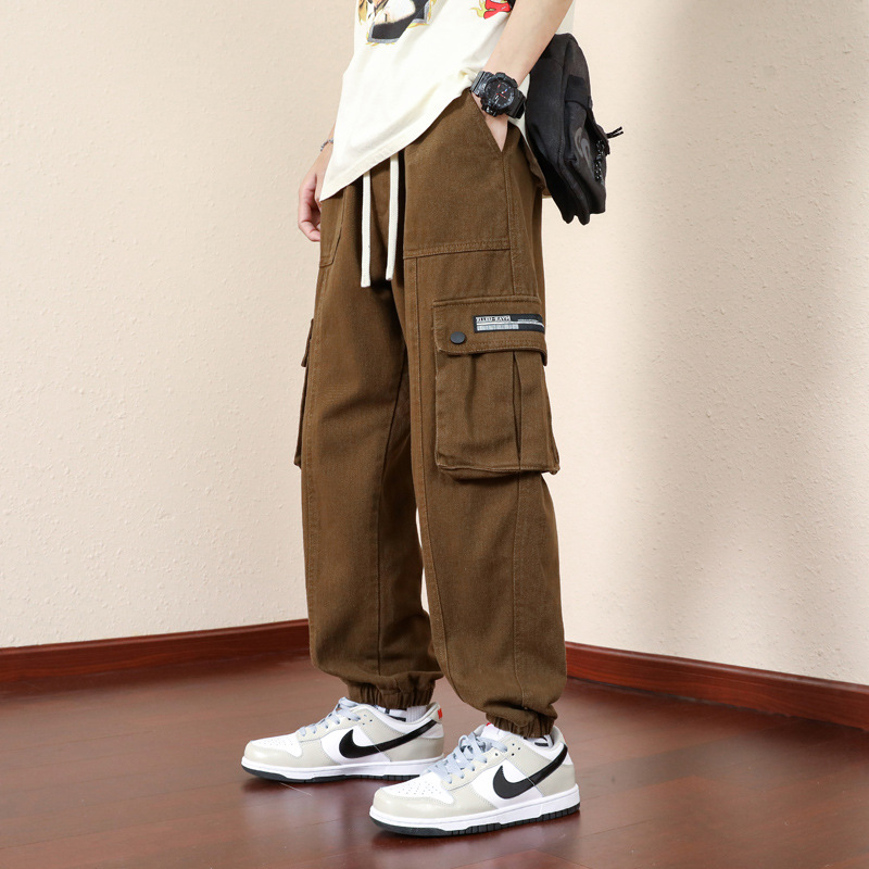 Pantalones de herramientas para niños primavera y otoño 2024 nueva tendencia suelta pantalones casuales pantalones de todo fósforo guapos para hombres