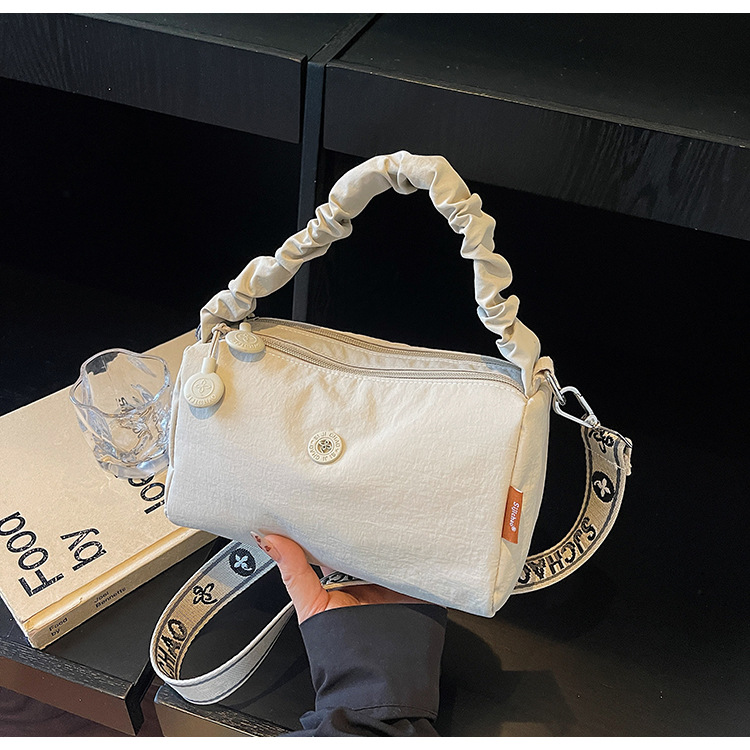 Bolso de tela de nylon de moda para mujeres 2026 nuevo estilo coreano bolso pequeño de tendencia nicho de diseño plegable bolso de mano image 11