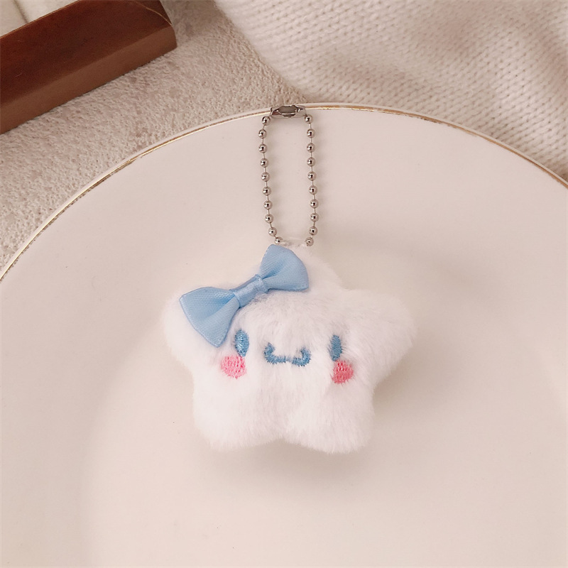 Nuevo estilo de felpa linda de dibujos animados arco estrella muñeca colgante monedero felpa auricular estuche llavero colgante