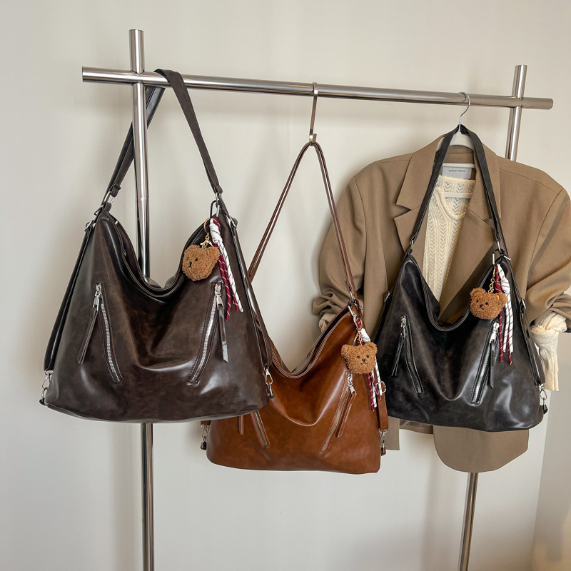 Otoño y invierno nueva mochila de gran capacidad de textura sólida coreana 2024 mochila de viaje de la moda de la mochila de trabajo