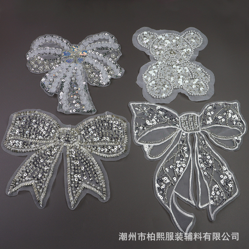 柏熙新款电脑珠绣亮片网纱欧根纱布底蝴蝶结小熊儿童服装布贴补丁