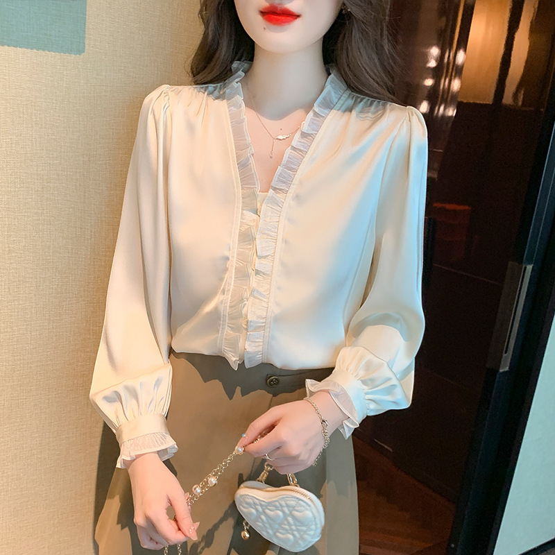 2023春の新しいフランスのレトロな気質の長袖のシャツの女性のデザイン感の小さい衆の木の耳元のvネックの上着|undefined