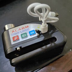 工場直売充電タイプ警報ロックオートバイ電気自動車ブレーキディスク警報ディスクロック盗難防止警報ディスクロック