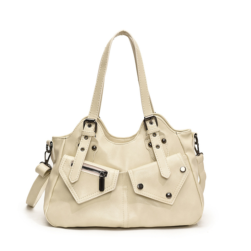 2024 transfronterizo retro Europa y América de gran capacidad bolso de hombro nuevo bolso de mochila empalmado bolso de mujer simple bolso de remaches bolso de mujer