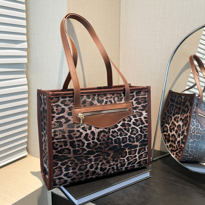 Bolso de gran capacidad de moda de leopardo para mujeres 2024 nuevo estilo de moda de viaje tote nicho diseño de hombro mochila