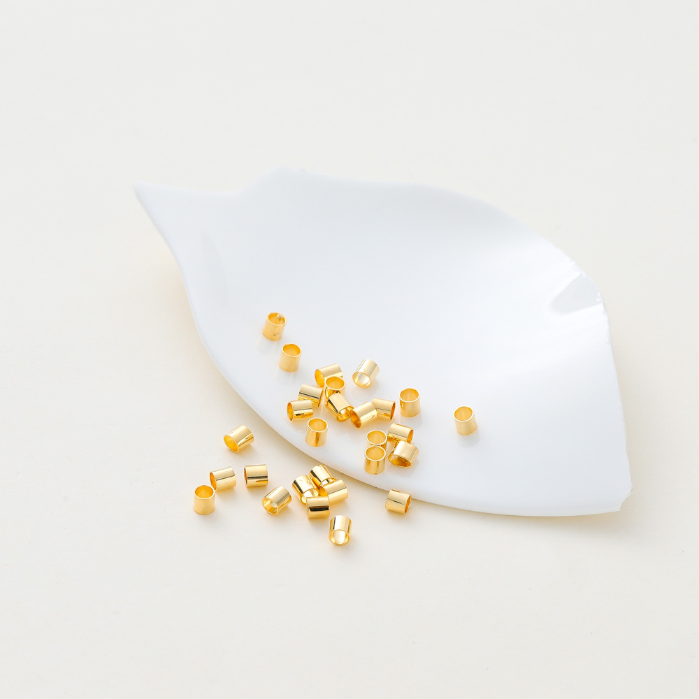 Cuentas de tubo de posicionamiento de alta retención de color 18k cobre chapado en oro real colocación de joyas de bricolaje pulsera de tubo redondo pequeño acabado hebilla fija