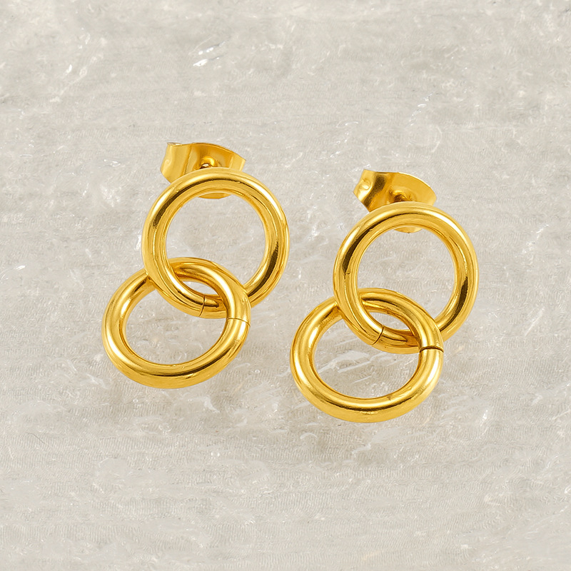 Pendientes de oro de 18k estilo INS Pendientes de anillo de tamaño de acero inoxidable Pendientes de acero de titanio entrelazados de anillo femenino Pendientes de acero femenino