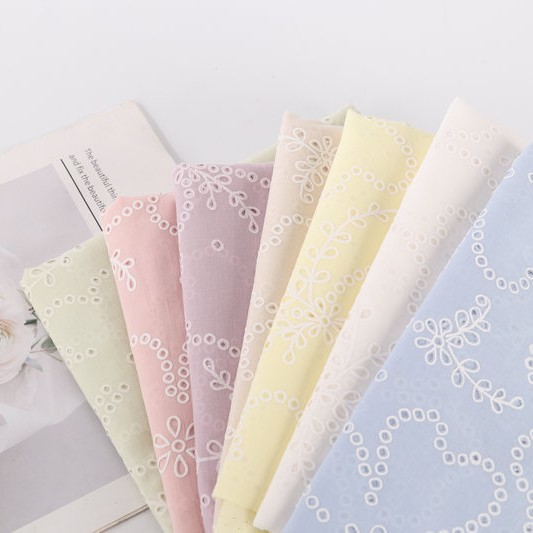 全棉打孔绣花面料镂空绣花棉布 简约时尚连衣裙女装时装衬衫布料