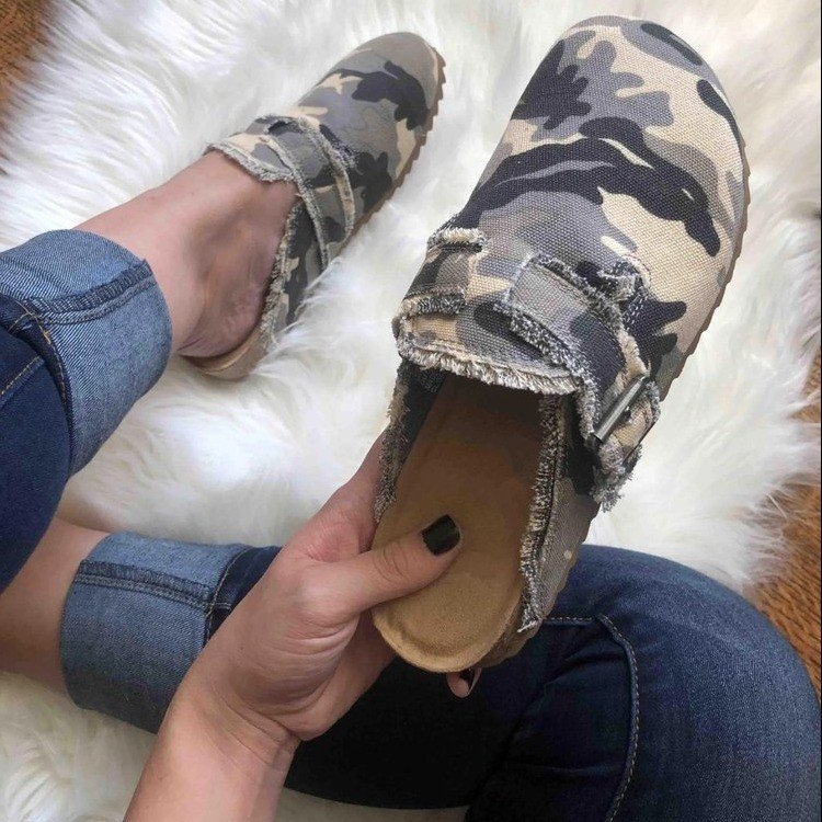 Scarpe mezze pantofole da donna estive nuove sandali con nappine a fondo piatto e testa rotonda indossati esternamente con cintura_voghion.com