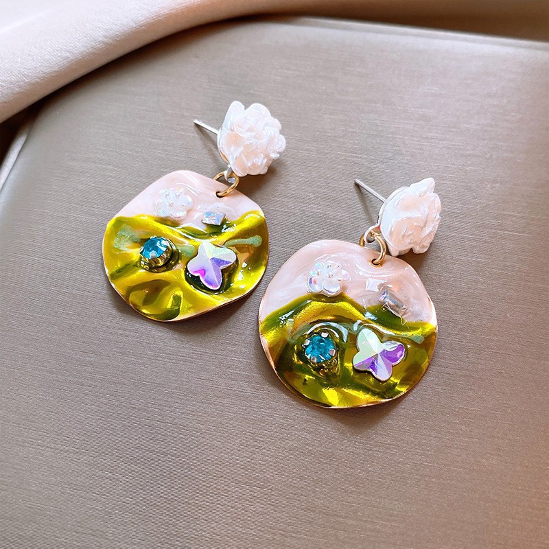 Temperamento de pendientes verdes pendientes ligeros lujosos de alto nivel sensación de pendientes zircon flores joyas geométricas al por mayor fábrica