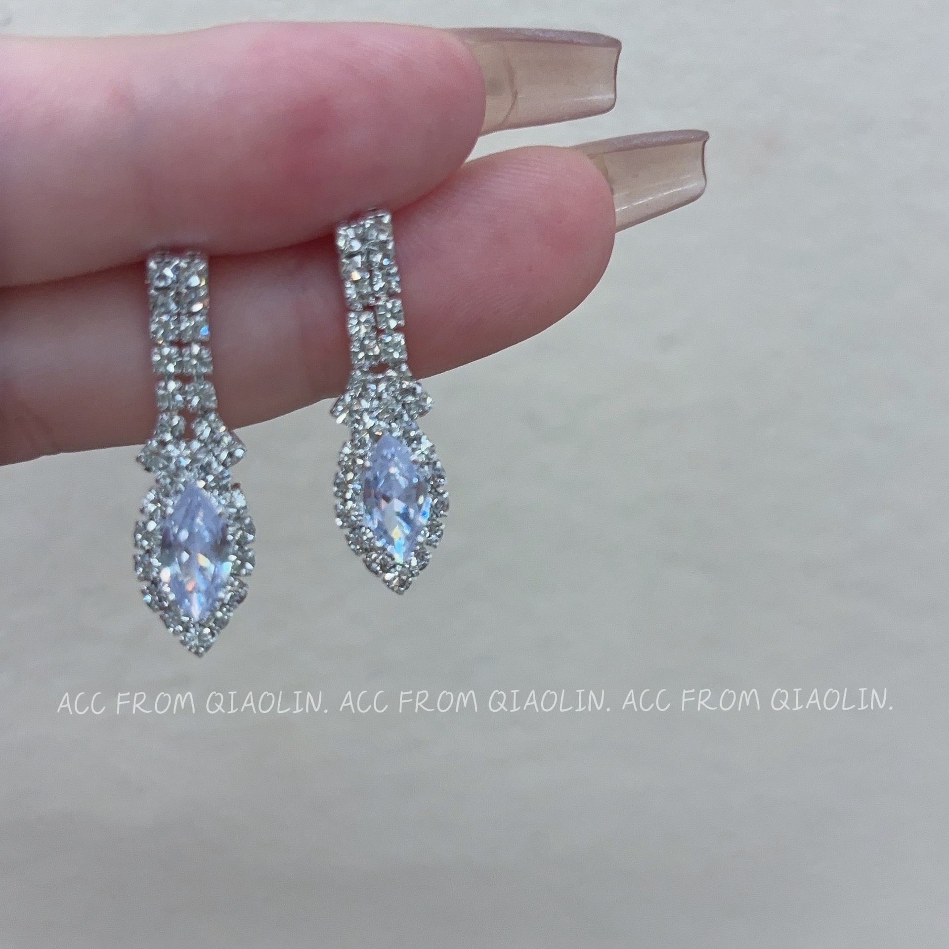 Earrings with zircon drop-shaped