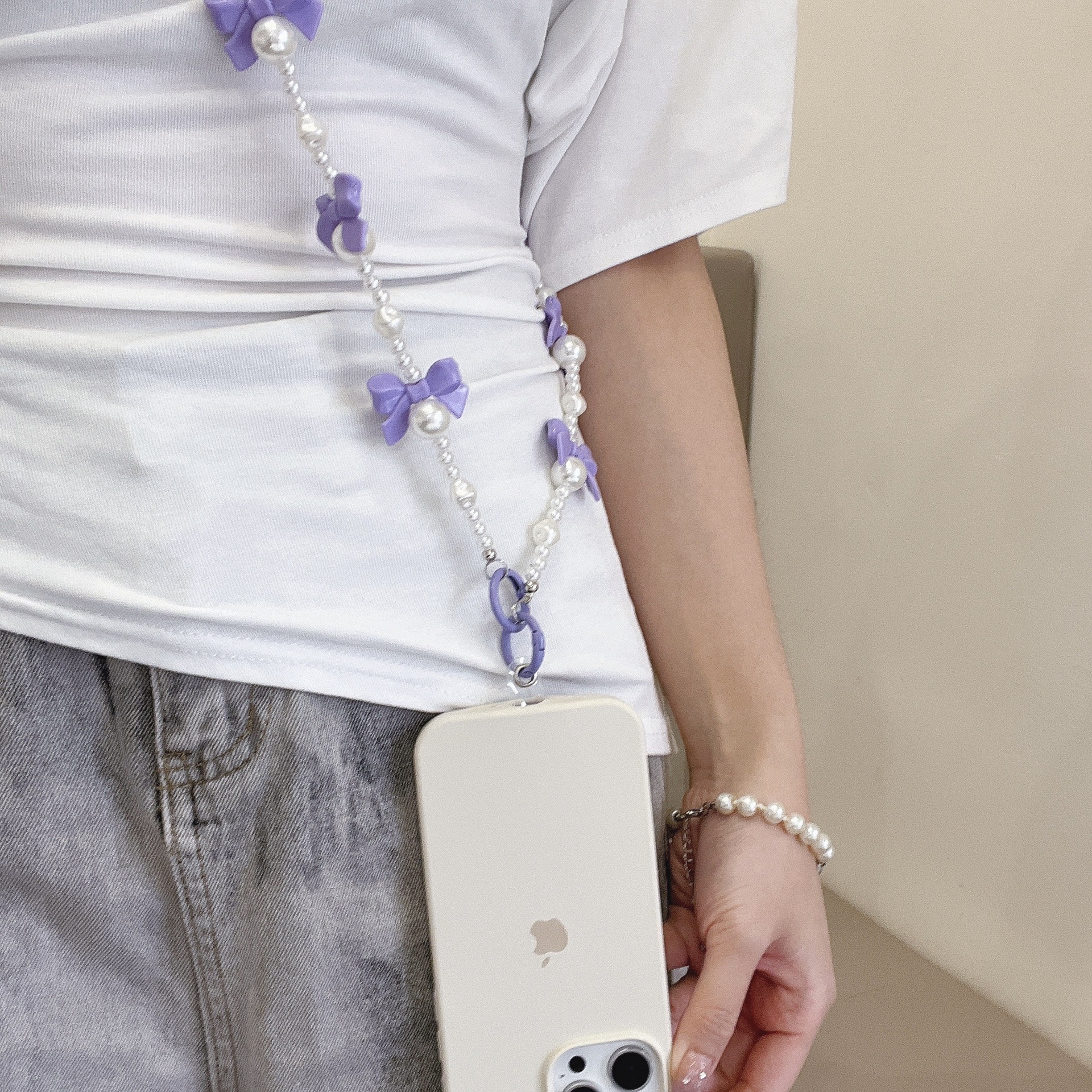 Verano color bowknot largo cadena de mensajero perla todo-fósforo bolso cadena larga cordón de teléfono móvil Xiaoqing aire fresco transfronterizo