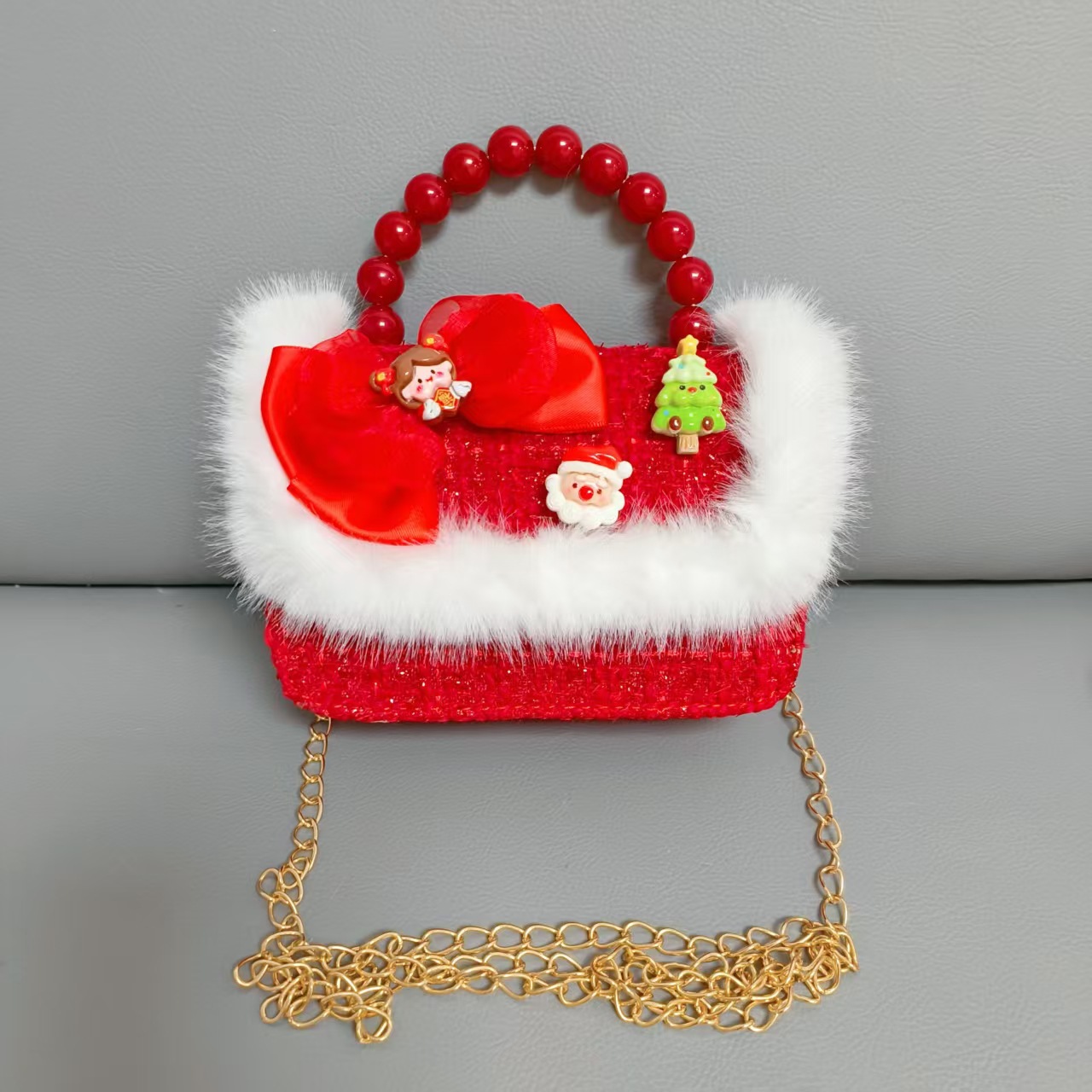 Cartera de Año Nuevo rojo arco de papá Noel bolso de perla pequeña cadena de viento fragante bolso de hombro