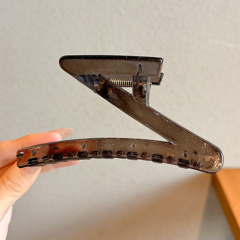 1 # gris transparente de unos 11,5 cm