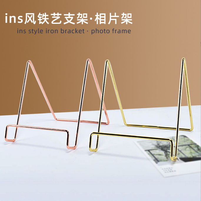 Ins Desktop Metal Stand Electroplated Plate Stand Wrought Iron Mobile Phone Holder Book Photo Display Iron Manufacturer Ins Style Ins Desktop Metal Stand Electroplated Plate Stand Wrought Iron Mobile Phone Holder Book Photo Display Iron Manufacturer Ins Style