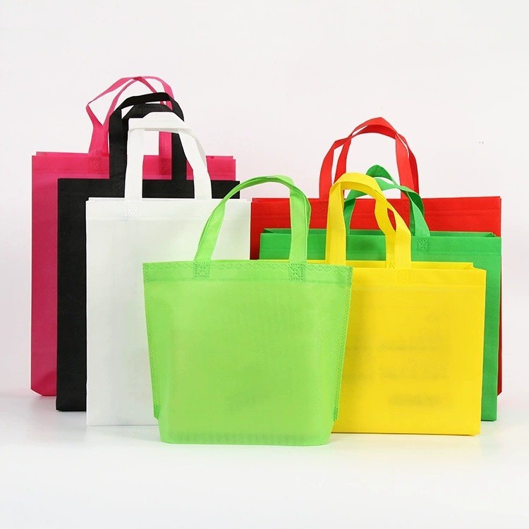 Bolsas de tela no tejida de gran tamaño recubiertas de película de mujer en stock bolsas de compras prensadas en caliente fijas pueden imprimir bolsas de publicidad LOGO