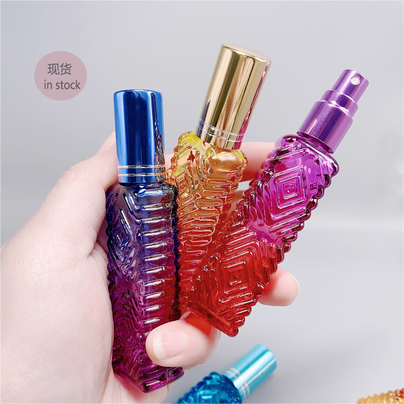 10ml botella de spray de perfume de vidrio de color boquilla de aluminio perfume sub-botella de líquido de prensa botella vacía en stock al por mayor