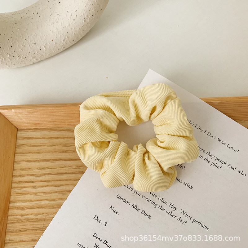 Anillo de pelo de intestino grueso de tela blanca