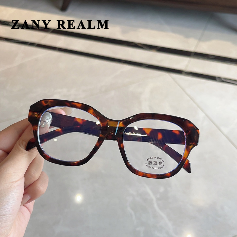 Nuevo estilo coreano retro ojo de gato marco grande anti-azul gafas de luz cara redonda versátil beige uñas marco negro gafas de Marco liso fabricante