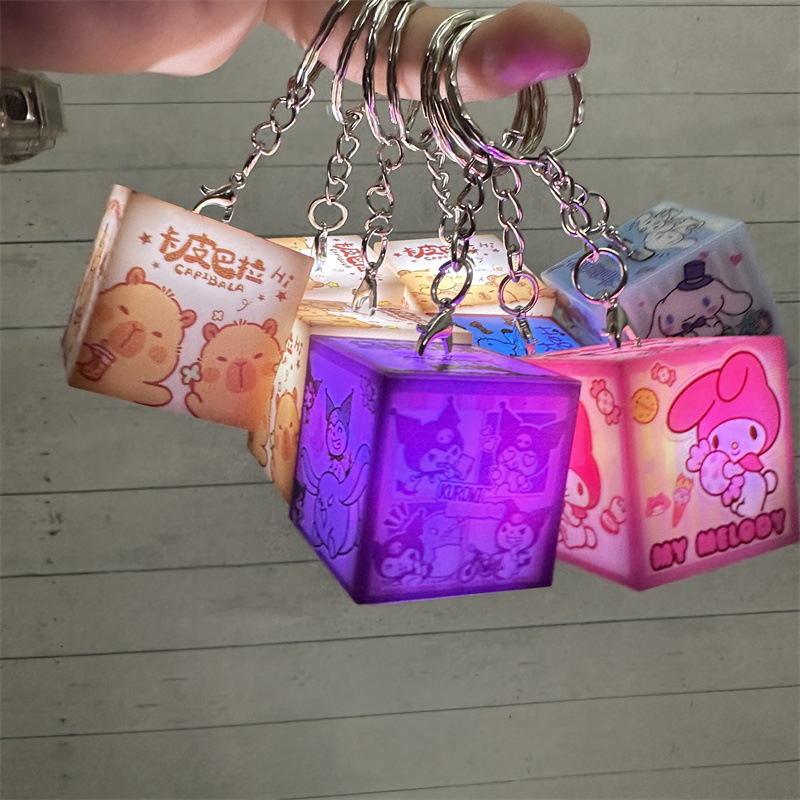 外贸卡皮巴拉发光钥匙扣佛系水豚带灯挂饰豚豚崽闪灯包包挂件礼品