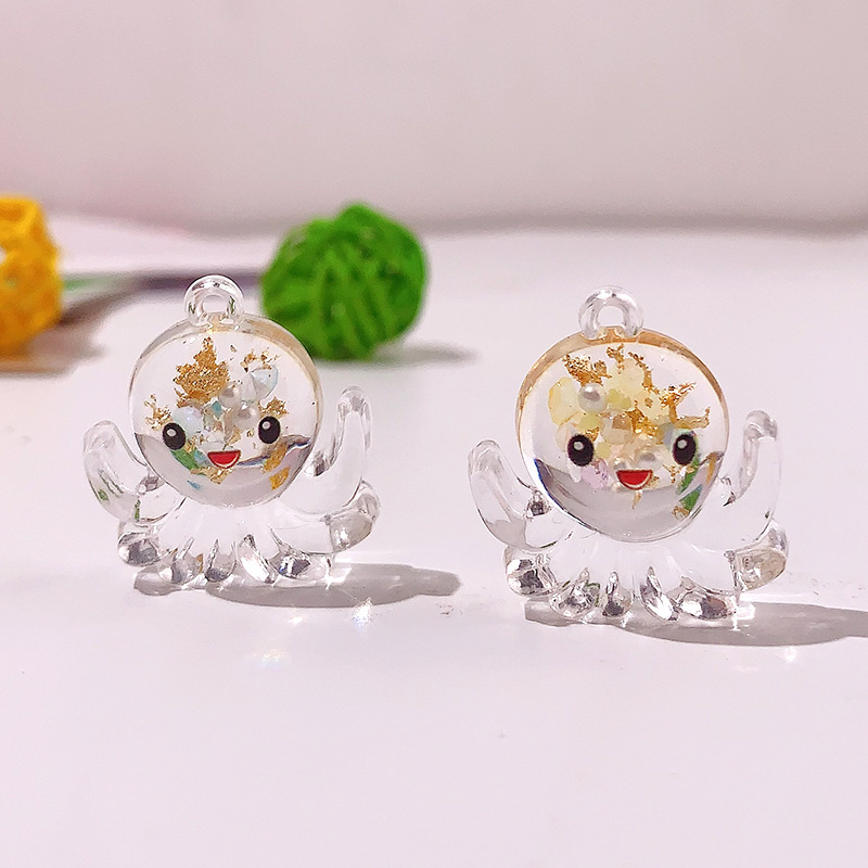 Nuevos accesorios de pulpo nocturno marino serie de cristal octopus llavero colgante DIY material pendiente