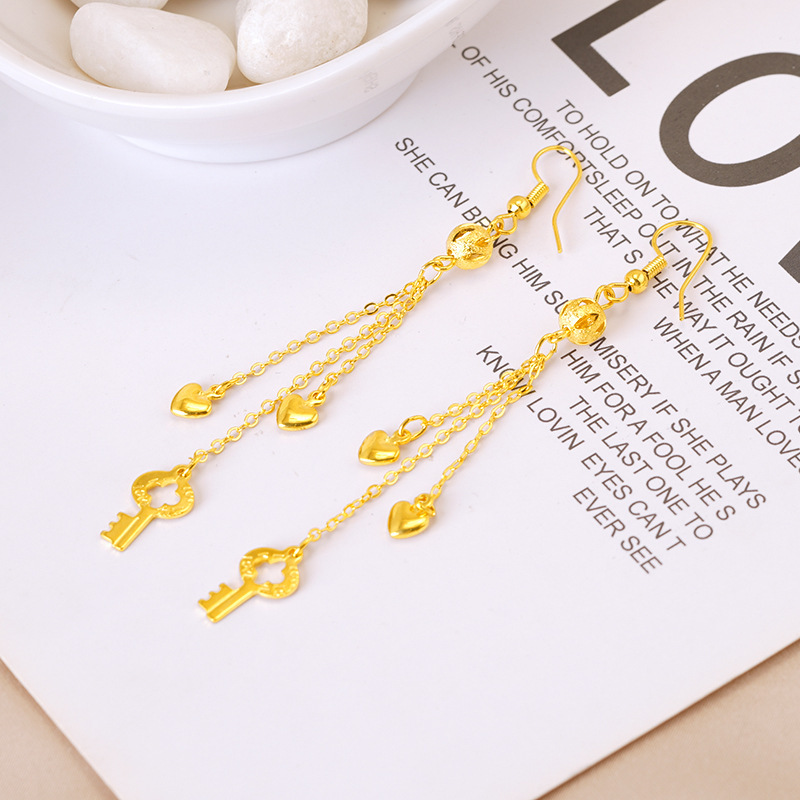 Pendientes de camelia de estilo antiguo Pendientes de verano de alta calidad para niñas con borlas Pendientes de oro de arena vietnamita que no se desvanecen durante mucho tiempo