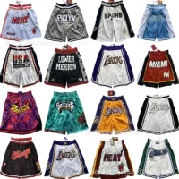Оптовые баскетбольные штаны Lakers Bulls Heat Nets Suns Dream One Year of the Tiger с вышитым карманом