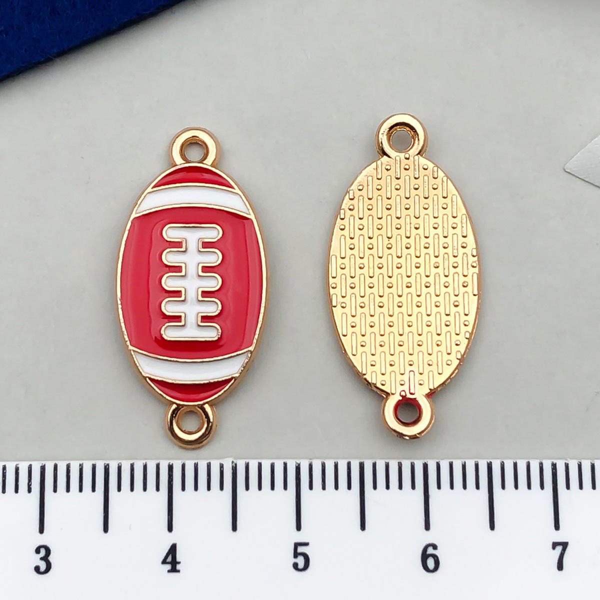 1 red football 26x12mm-1.4g-21731