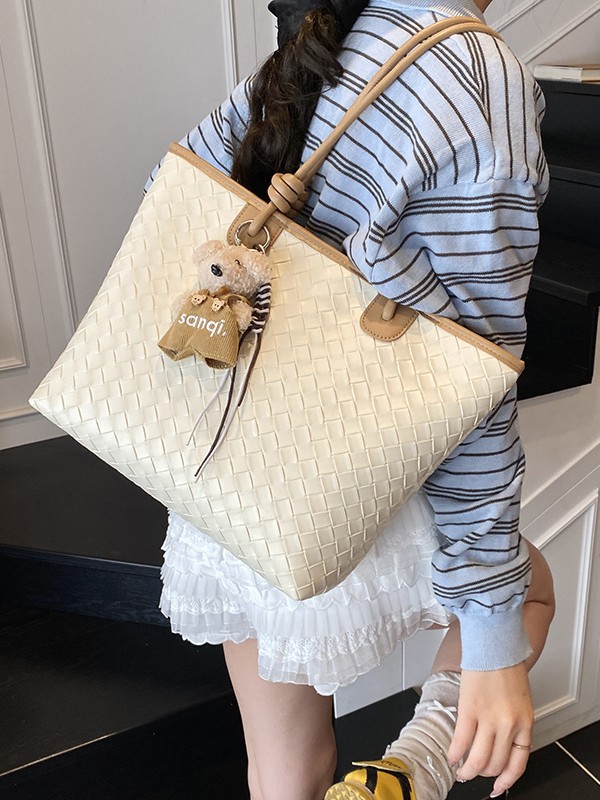 Bolso de patrón tejido de gran capacidad Bolso de hombro de cercanías de moda transfronteriza para mujer Bolso de tote de todo fósforo casual de alta gama