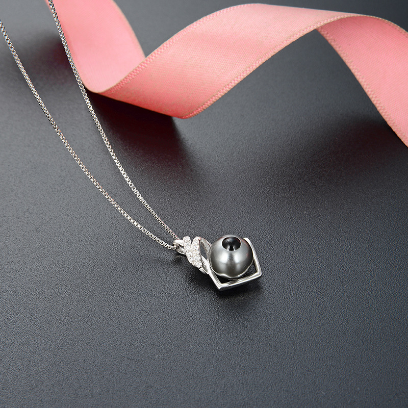 Europa y América simple nicho personalizado collar de cadena clavícula perla S925 plata estilo frío con incrustaciones colgante femenino al por mayor