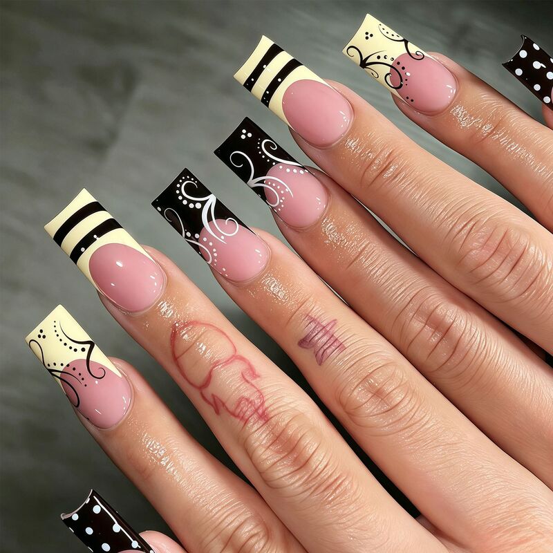 Cross-border bestseller: yellow and black French polka dot fake nails, wearable nails with sweet and cool black vine stripe polka dot design Cross-border bestseller: yellow and black French polka dot fake nails, wearable nails with sweet and cool black vine stripe polka dot design