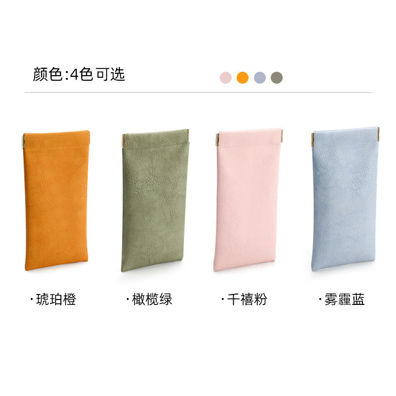 2026 nueva caja de gafas de sol de moda de cuero de dos colores bolsa blando miopía caja de ojos conjunto completo de bolsa de espejo tela