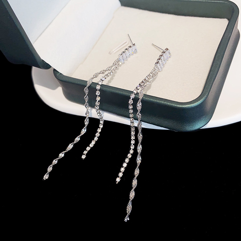 Elegant long earrings with zircon with tassels