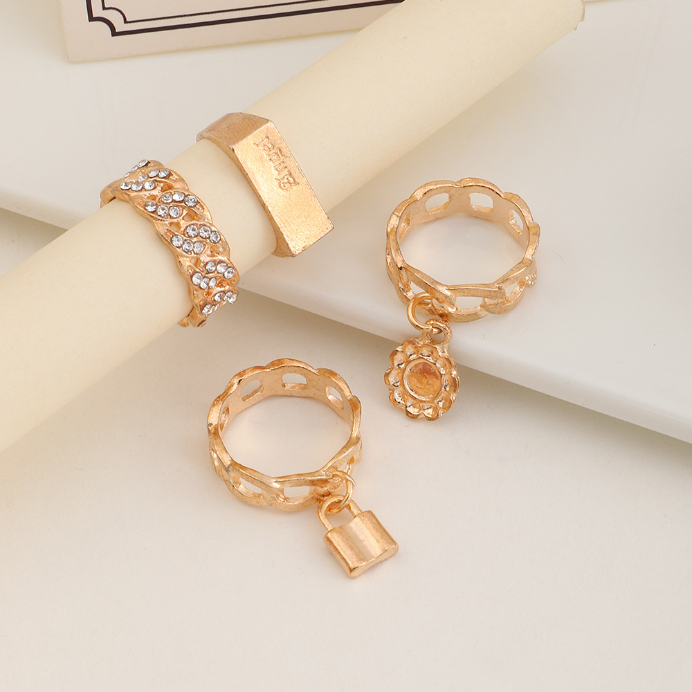 Fashion Micro-inlaid Diamond Hollow Lock Letter Tacking Ring Set display picture 3