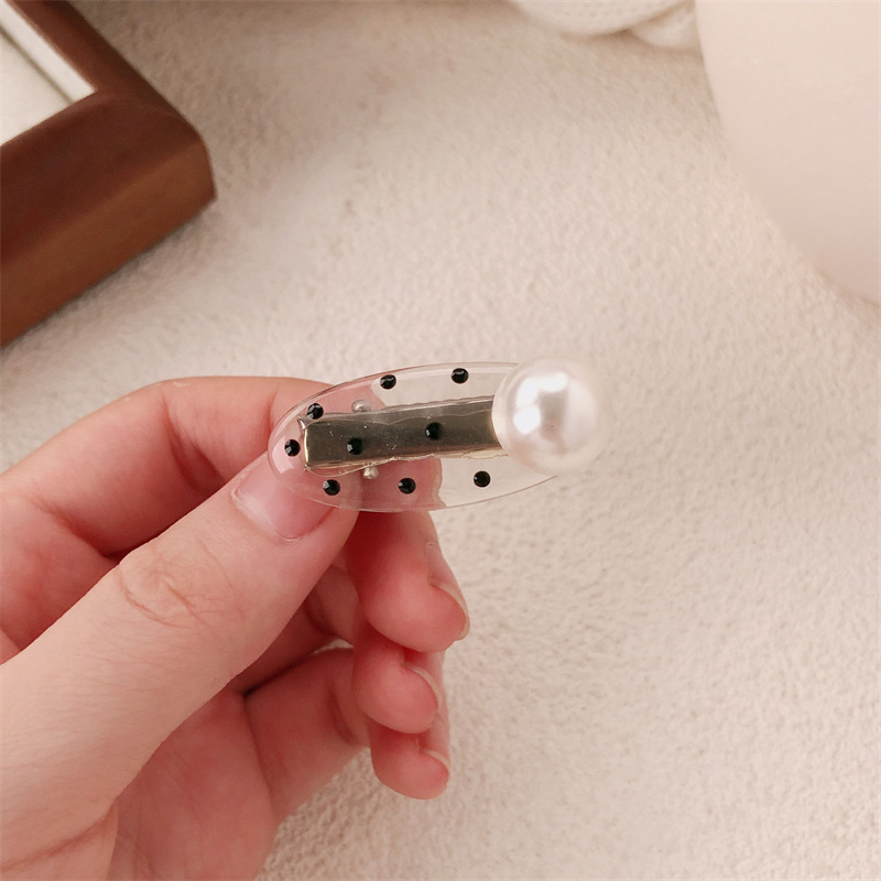 Princesa cabeza de perla ondulado punto elíptico pequeño frijoles rojos pin de pelo estilo francés de alta sensación lateral ceja pin de pelo adornamiento