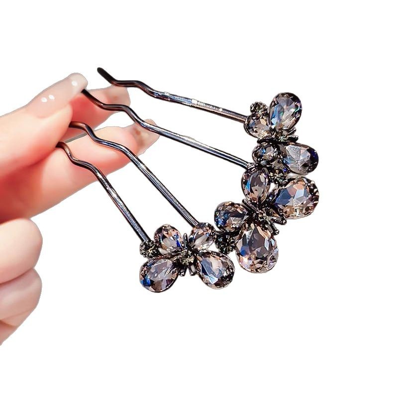 Papillón de cristal de alta sensación en forma de U pinzas de cabello pinzas