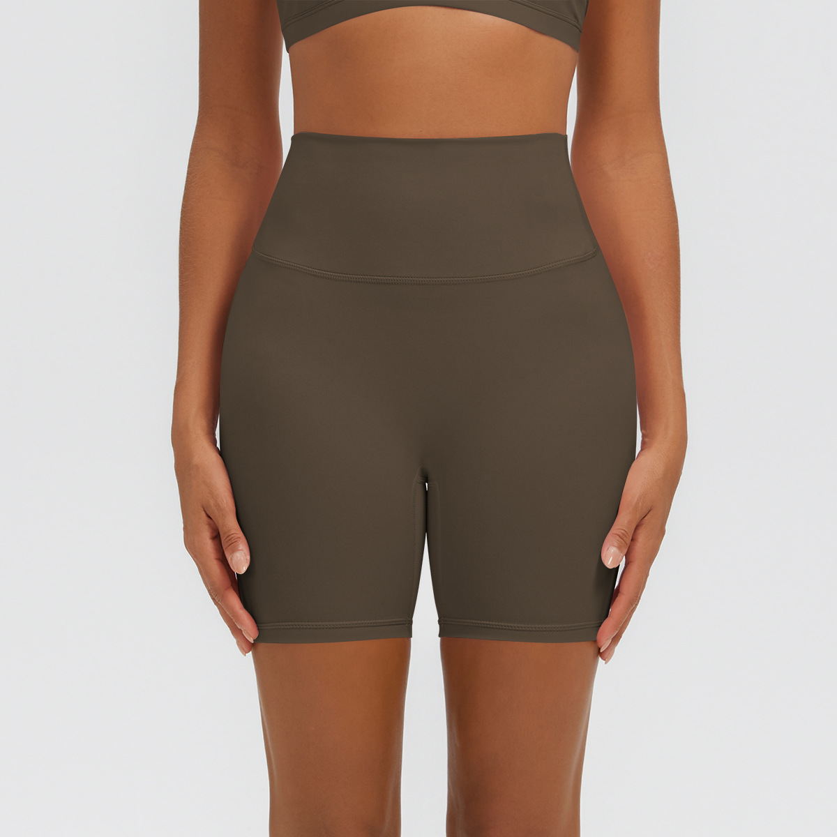 Nuevo tipo delgado de hielo, piel transpirable, ajustado, color sólido, ropa de yoga, pantalones cortos de tres puntos.