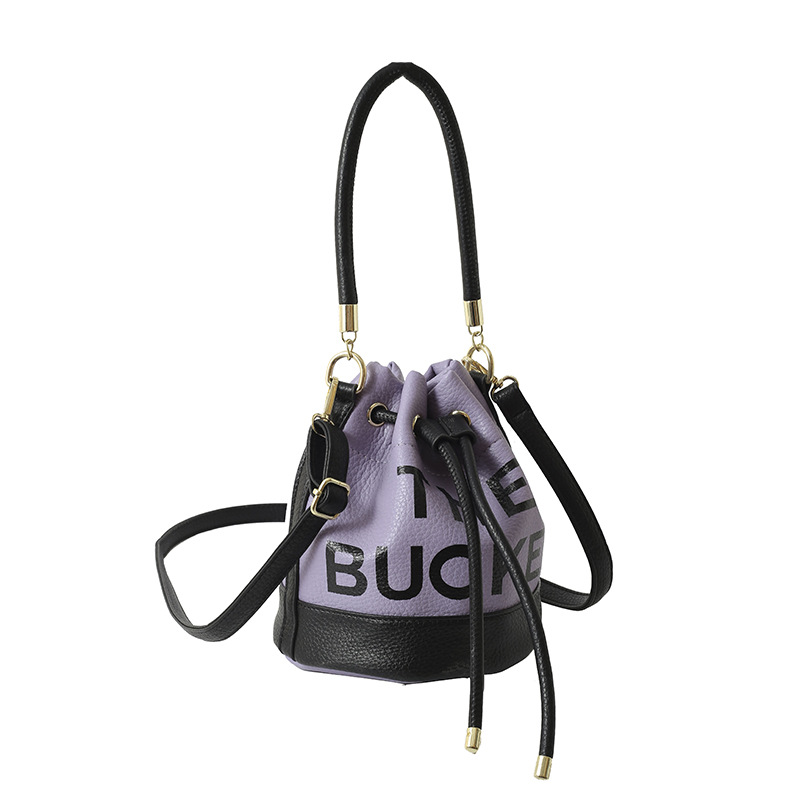 Bolso de hombro femenino casual todo-fósforo diseño de nicho sentido contraste color costuras cubo bolso de mano moda tendencia bandolera